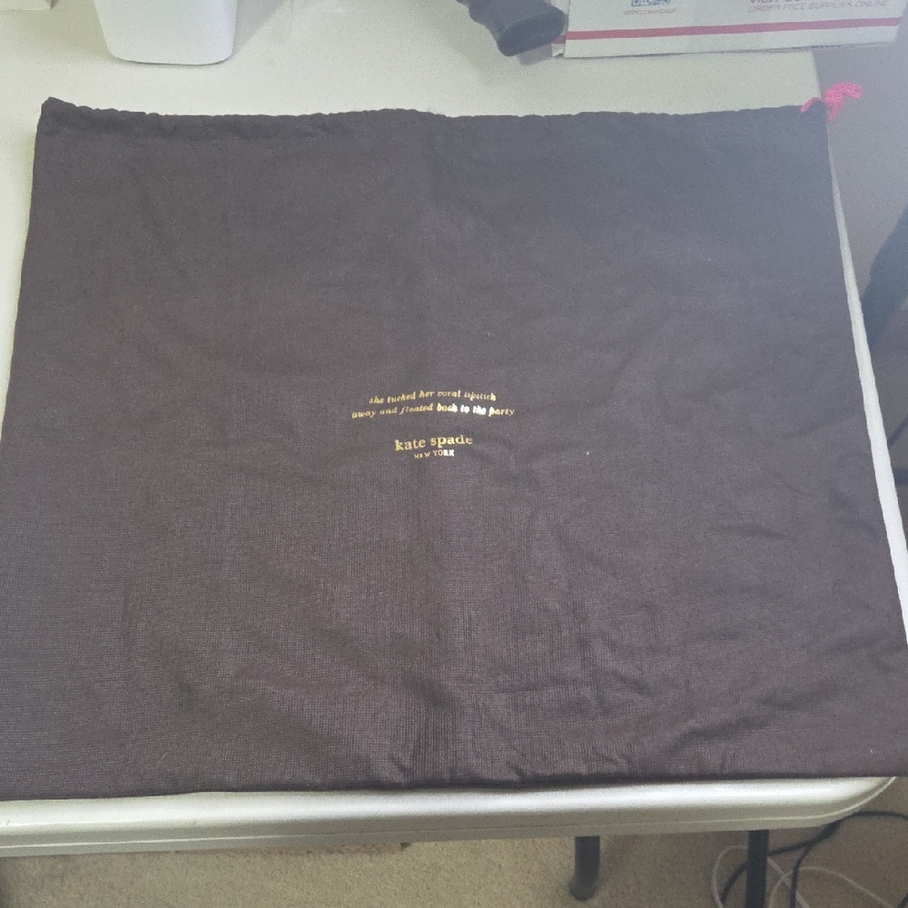 kate spade Brown dust bag with gold logo and pink drawstring